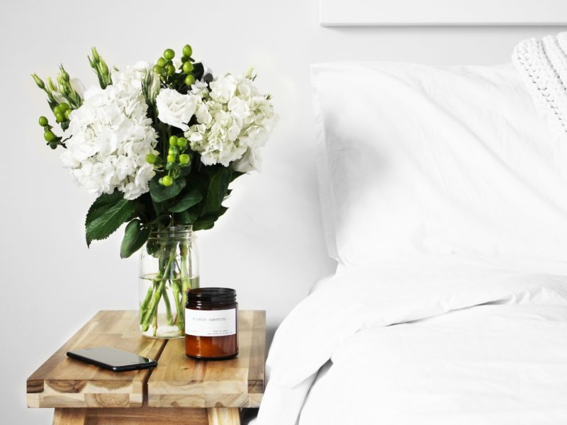 wellness sanctuary: a cozy bed and flowers