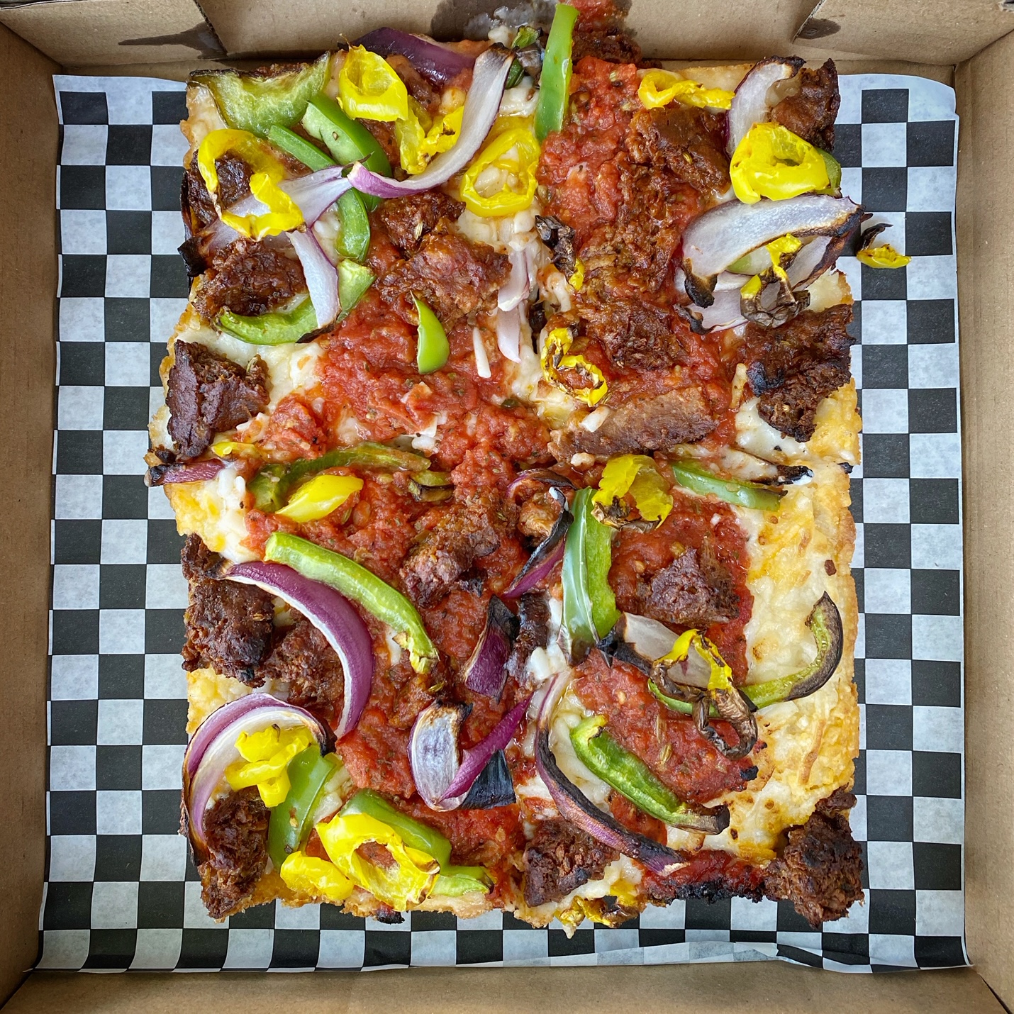 Guerrilla Pizza serves Detroit vegan pizza in Las Vegas. For more vegan pizza options in Las Vegas, visit www.vegansbaby.com