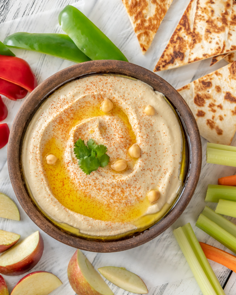 Hummus and veggies make a perfect vegan snack